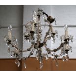 An early 20th Century, nine branch chandelier, the