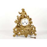 A 19th Century, French, gilt, figural mantle clock