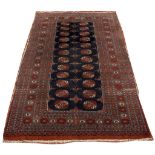 A late 20th Century Pakistan Bokhara rug, midnight