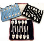 A Walker & Hall silver mote spoon set of 12, a set