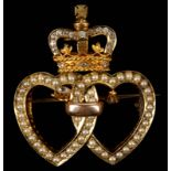 A Victorian 15ct gold double heart brooch, set wit