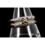 A 9ct gold and pavè diamond set, double band ring,