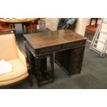 A Chinese padouk wood, twin pedestal desk, with an