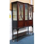 An Edwardian walnut and inlaid china display cabin