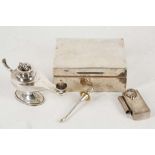 A silver cigarette box, London 1937, a silver Alad