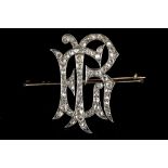 A Victorian monogram brooch, the silver initials '