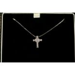 An 18ct white gold and diamond set cross pendant o