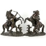 A pair of 19th Century, French bronze sculptures a