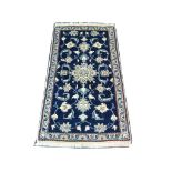 Persian Nain wool and silk rug, 1.24m x 0.71m, con