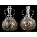 A pair of 19th Century Dutch twin handled carafe with ripple decoration, enriched with gilt