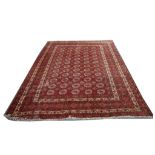 Afghan Bokhara carpet, 2.65m x 2.16m, condition ra