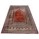 Transylvanian 'Mihrab' design rug, rich terracotta