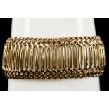 A vintage continental 18k gold cuff bracelet, comp