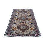 Persian Azerbajan rug, cream ground, animal decora