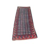 Persian Balouch rug, 1.87 x 0.79m, condition ratin