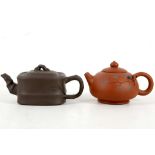 Two Chinese Yixing Zisha teapots, one with pine br