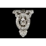 An Art Deco 18ct white gold and diamond dress clip