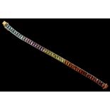 An 18ct gold rainbow gem bracelet, set with garnet