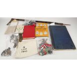 Militaria badges, books, course notes, German meda