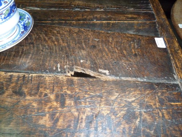 An Elizabethan style oak refectory table, the three-plank top on leaf carved rails and bulbous - Image 7 of 8