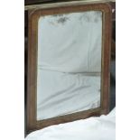 A George II parcel gilt wall mirror, with rectangular plate, 78.75cm  high Condition Report: This