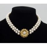 A two-row cultured pearl choker, on an 1