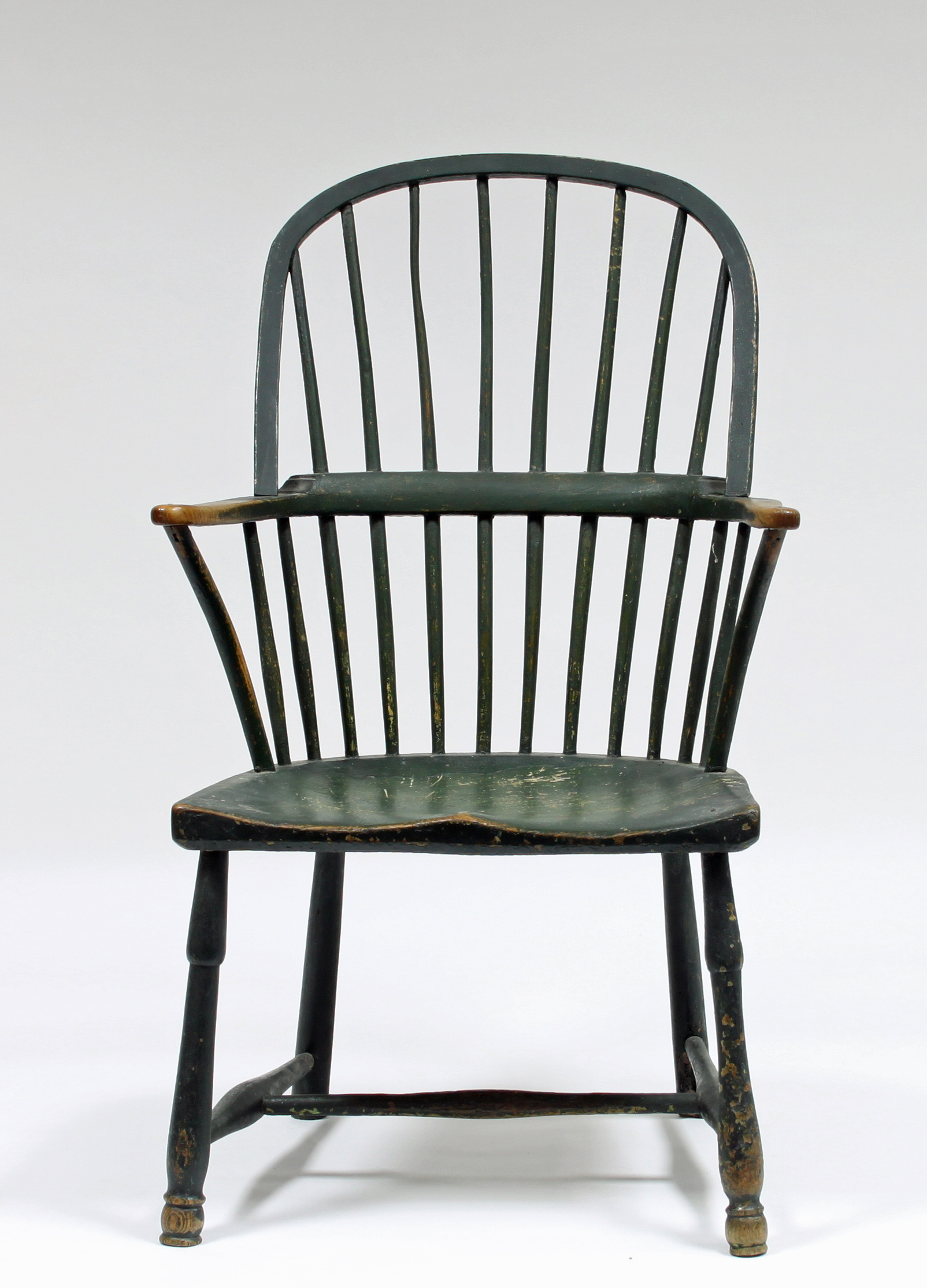 A painted stick back Windsor armchair, circa 1800, with traces of original paint Condition Report: