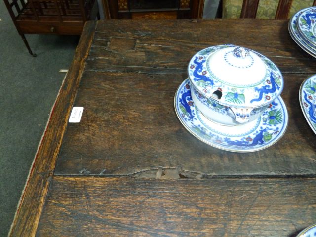 An Elizabethan style oak refectory table, the three-plank top on leaf carved rails and bulbous - Image 8 of 8