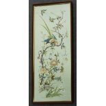 A Chinese silkwork picture depicting an Asiatic pheasant on a flowering branch, smaller birds flying