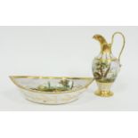 A Paris porcelain ewer and navette-shaped basin, circa 1810, each painted a continuous scene of