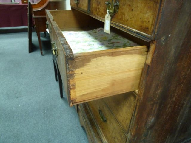 A Queen Anne walnut chest on stand, circa 1710, the chest with two short and three long drawers on a - Image 5 of 6