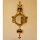 An Italian carved and gilded mirror, the