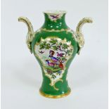 A Worcester green-ground two-handled vase, circa 1770, of baluster form with upright scroll handles,