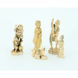 Four Japanese okimono figures and a plastic figure of Guanyin, various sizes Condition Report: