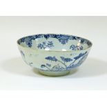 A Delft blue and white bowl, circa 1780, decorated an island pavilion, 31cm diameter Condition