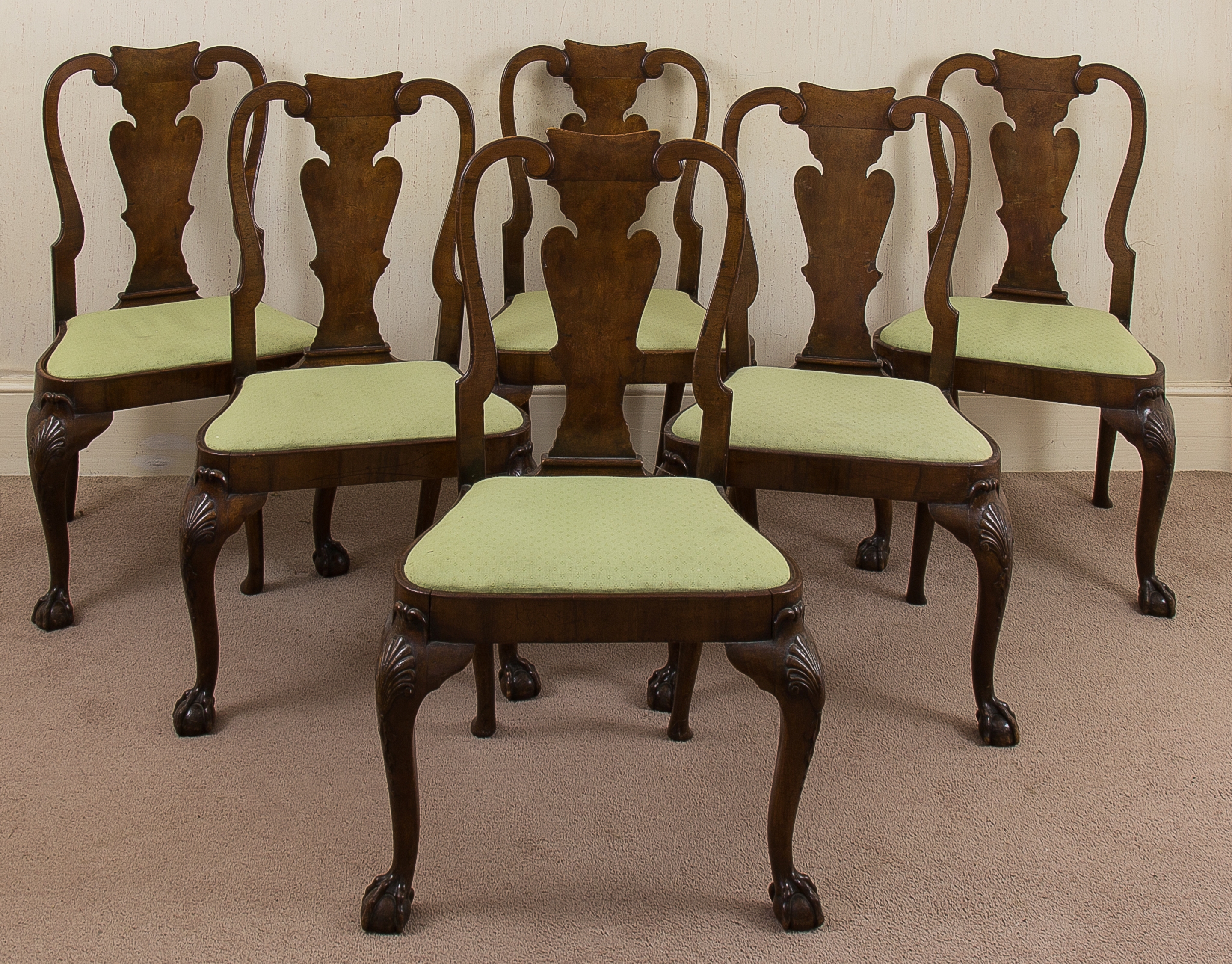 A set of eight George II walnut dining c