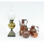 A brass oil lamp with chimney and shade,