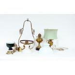 A hanging brass lamp with opaque shade a