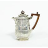 A silver jug and cover, London 1890, par