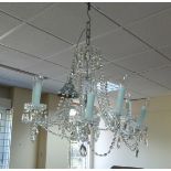 An eight-light cut glass chandelier, 20t