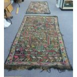 Two kilim type rugs, both with multi col