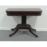 A William IV mahogany card table on cent