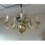 A Dutch brass eight-light chandelier, wi