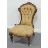 A Victorian button back nursing chair wi