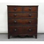 A large mahogany chest of two short and