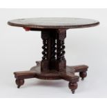 A Victorian circular carved pedestal table, with five spiral pillars, the circular base with