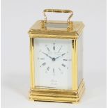 A brass cased carriage clock by F W Elliott & Co, retailed by Boodle & Dunthorpe, Chester &