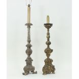 A 17th century style Italian carved and silvered altar candlestick, turned on a triform base,