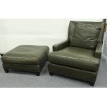 A modern green leather upholstered armchair with footstool to match, by Baker