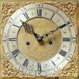 A late 18th Century mahogany cased eight-day longcase clock, the hood with broken arch finial and